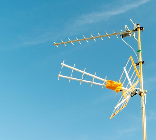 low-angle-shot-television-antenna-captured-sunny-day-with-clear-sky (1)
